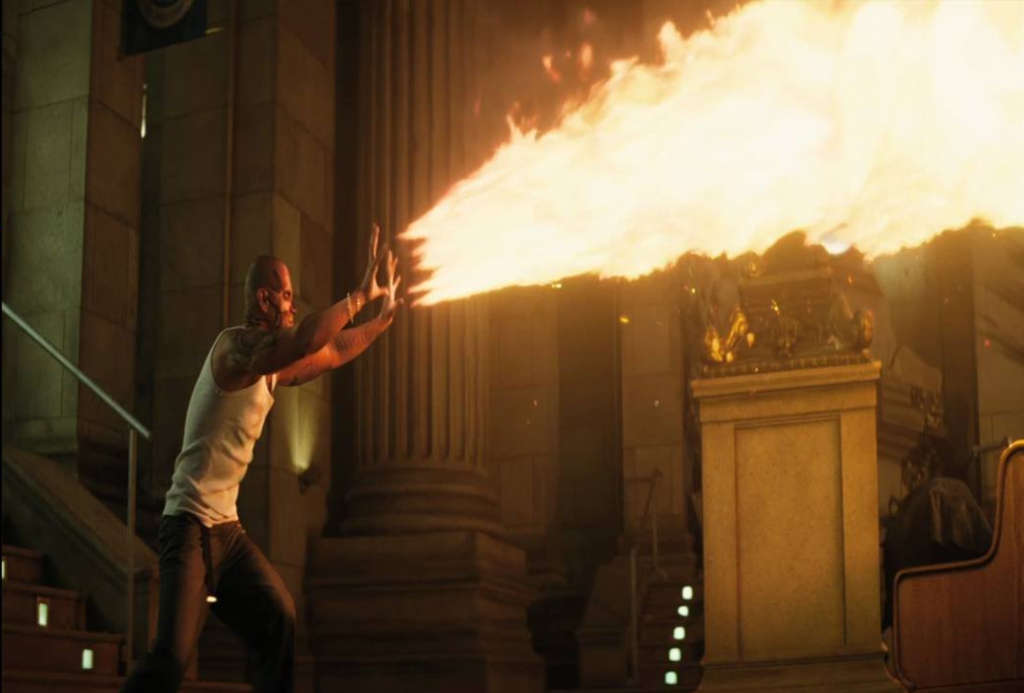 Diablo dans le film Suicide Squad 2 faisant de la pyrokinésie en projetant de grandes flammes devant lui avec ses deux mains.